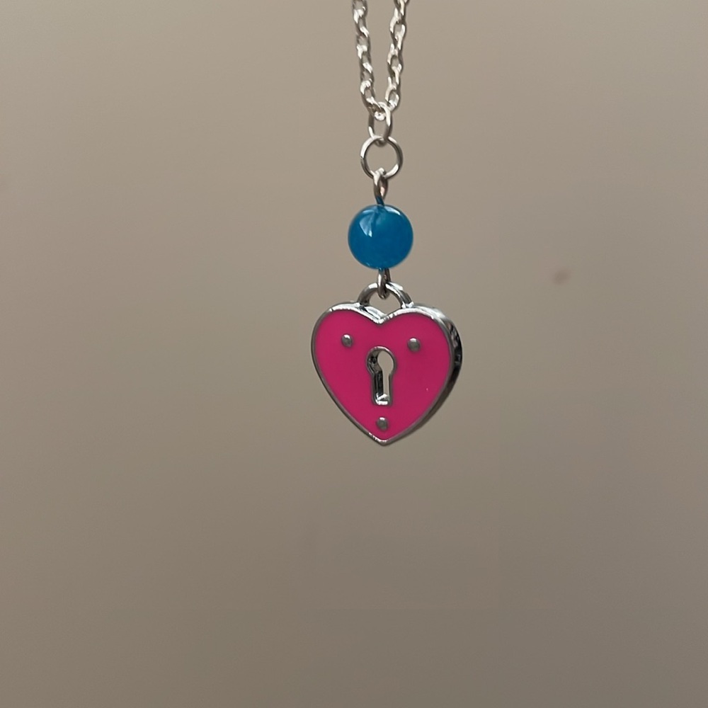 Pink faux locket and blue gemstone necklace